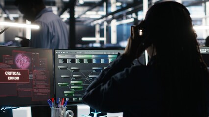 Data center programmer seeing critical error message while using node tree software to analyze datasets. Server room worker receiving glitch popup warning while using visual programming tool, camera B