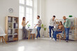 © Studio Romantic - People leading their daily life in an office workplace. Several young male and female employees meeting at work and discussing business startup projects. Business, lifestyle concept
