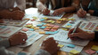 © LVS Studio - A collaborative business meeting with people brainstorming using colorful sticky notes, charts, and reports spread across the table for planning and strategy development.