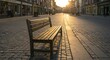 © tembok - Empty wooden bench on cobblestone street at sunset with sun rays