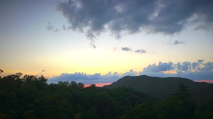 Wall Mural - Majestic Smoky Mountains Sunset Time-Lapse with Vibrant Sky and Mountain Silhouette