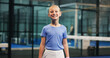 © Azee25/peopleimages.com - Tennis portrait, child and happy on court for match practice, game exercise and tournament workout. Padel, junior club and girl kid with smile at sports facility for about us, development or training