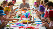 © Kisame - Families engaged in a vibrant craft activity, decorating hats with colorful feathers and embellishments.