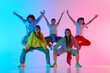 © Lustre Art Group  - A dynamic group of diverse young adults showcases youthful urban dance culture in a vibrant, colorful performance. Concept of modern city arts and youth expression.