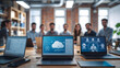 © Faraz-9461894 - A group of professionals are collaborating on a project, using laptops and cloud technology in a modern office space