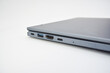 © Maule - Closed laptop showing side ports including USB, HDMI, and Type-C, concept of connectivity, modern technology, and portable computer design.