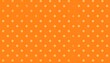 © gentho - Orange polka dot pattern background.