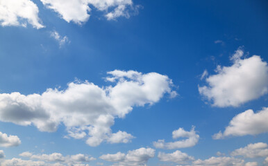 Wall Mural - a beautiful blue sky with soft, white clouds, for an abstract background