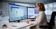 © Andrey Popov - Senior Analyst Predicts Market Trends Using Financial Data On Computer
