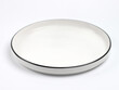 © Cahya - White plate with black border on white background