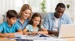 © Soem - A family of four, consisting of a mother, father, son, and daughter, working together on a laptop in a home office setting.