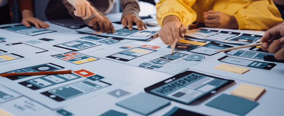 a dynamic design workshop scene showing diverse hands engaged in collaboration, focus on user interf