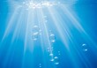 © Naru - Underwater Sunlight and Bubbles - Serene underwater scene, sunlight rays penetrate the surface, illuminating rising bubbles. Symbolizing purity, peace, renewal, hope, and tranquility
