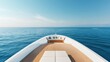 © Arfa_Media - Luxury yacht sailing in calm blue sea with comfortable seating area on deck