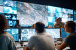 © Alina - Response center analyzes data on multiple screens during critical operations