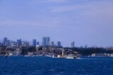 View of the Bosphorus. Maiden's Tower and the 15th of July Bridge. Tourism destination. Ships passing through the Bosphorus. Istanbul - Turkey.