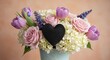 © dedy - Romantic floral arrangement with a dark heart accent in a pastel color scheme