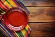© Maple Stock Photo - Traditional Mexican cloth enhancing the simplicity of a clay plate.