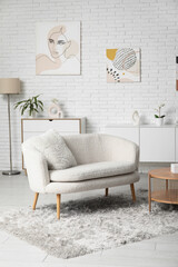 Poster - stylish interior of modern living room with white sofa and coffee table
