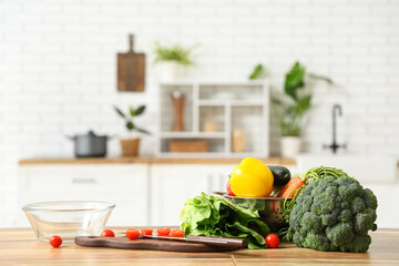 Wall Mural - Different fresh vegetables on wooden kitchen counter