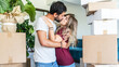 © Davide Angelini - Husband and wife moving in new home - Young couple just moved into new apartment - People and relocation concept.