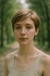© Oleksandr - Young caucasian female in forest setting with short hair