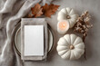 © john - bright elegant menu or invitation card mockup with festive autumn / fall themed table setting with white pumpkins, candle and natural leaf, ideal for thanksgiving or seasonal weddings - flat lay
