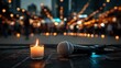 © Nadimul - Lit candle and microphone on stage with bokeh lights image