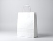 © yeremikonovanda - Stylish white paper shopping bag mockup offers clean branding potential for retail and promotional designs now