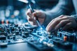 © DIMENSIONS - Close-up of engineer's hands working on electronic circuit board with precision tools in high-tech laboratory environment, showcasing innovation in technology and electronics