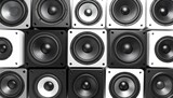 Monochromatic Sound Wall: A Graphic Grid of Black, White, and Silver Speakers