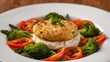 © DEER FLUFFY - Gourmet Fish Cake with Creamy Sauce and Fresh Vegetables on a White Plate.