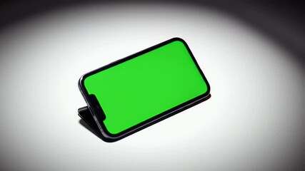 Green Screen Smartphone Mockup. Isolated Mobile Device with Blank Chroma Key Screen on White Background. Perfect for App UI/UX Display.