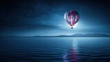 A hot air balloon floats peacefully over a serene lake at night under a full moon