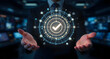 © isma01 - Businessman Presenting a Futuristic Digital Interface with Checkmark Symbolizing Validation and Approval in Technology
