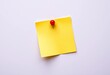© Kittiya - Bright yellow sticky note affixed to surface by a vibrant red pushpin,  attention,  macro