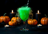 Halloween green cocktail drink with pumpkins and candles | Minuman koktail hijau Halloween dengan labu dan lilin