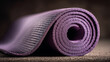© Sabana - A close up shot of a partially rolled purple yoga mat revealing its textured surface and circular form