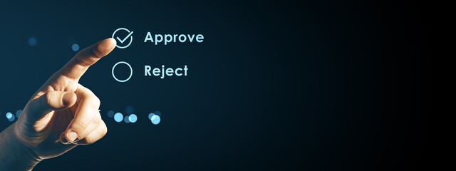 Finger pressing approve button on digital interface with reject option on dark background, symbolizing decision-making and user interaction concept.