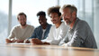 © SolaruS - Diverse group of smiling professionals collaborating at a modern office table. Represents teamwork, success, and shared vision. Ideal for business, education, and diversity concepts.