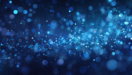 Deep blue bokeh background with swirling light particles