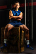 © Camilo - Athlete Latino man posing in the gym, ready for a workout routine, studio shot. Concept of exercise, gymnastics, sports, health, and wellness.