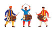 © PojokMillennials - Three men in traditional attire playing drums, performing with sticks, and celebrating.