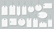 © homan - A large collection of blank hanging white tags.