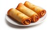 © nuanjan - Three crispy golden brown spring rolls are arranged side by side on simple white plate