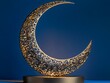 © Nurul - Intricate crescent moon lamp glowing with elegant cut-out design