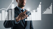 © MdMojibor - Businessman Touching a Virtual Growth Chart Displaying Financial Performance and Positive Trends, Illustrating Business Strategy and Investment Opportunities for Success