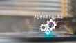 © FAMILY STOCK - Agentic AI technology concept with coding and digital gears. Artificial intelligence automation, machine learning, and futuristic innovation for business solutions.