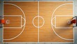 © miss irine - Empty worn wooden basketball court with markings and hoops. Overhead view of arena with white lines, gray walls, and suspended basketball. Two hoops stand at opposite ends of the court.