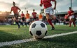 © MDLATIFUR - Soccer ball on field with players running